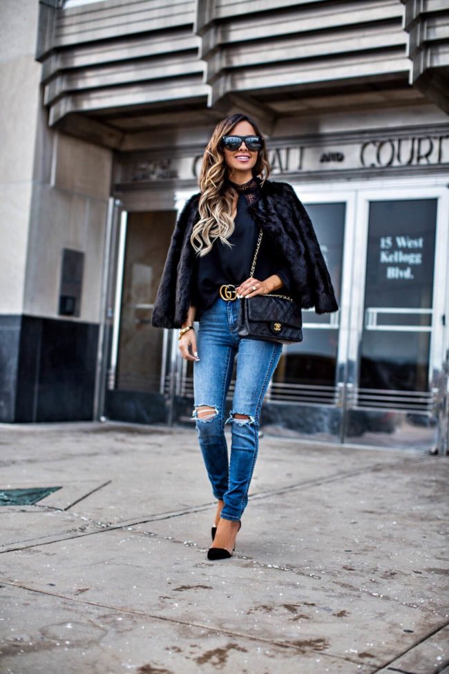 mn fashion blogger mia mia mine wearing a black top from jc penney and a faux fur jacket