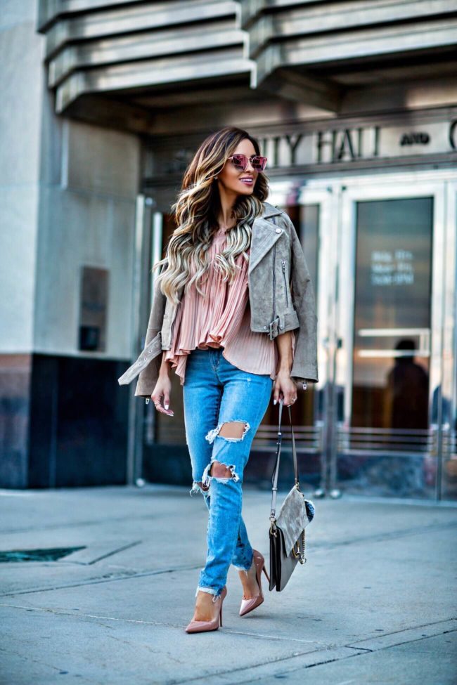 fashion blogger mia mia mine wearing a blank denim suede moto jacket and lovers + friends jeans from revolve