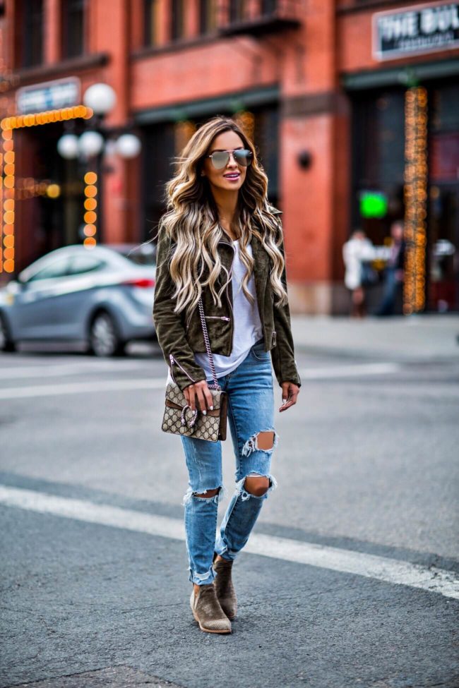 fashion blogger mia mia mine wearing distressed denim from revolve and a blanknyc suede jacket