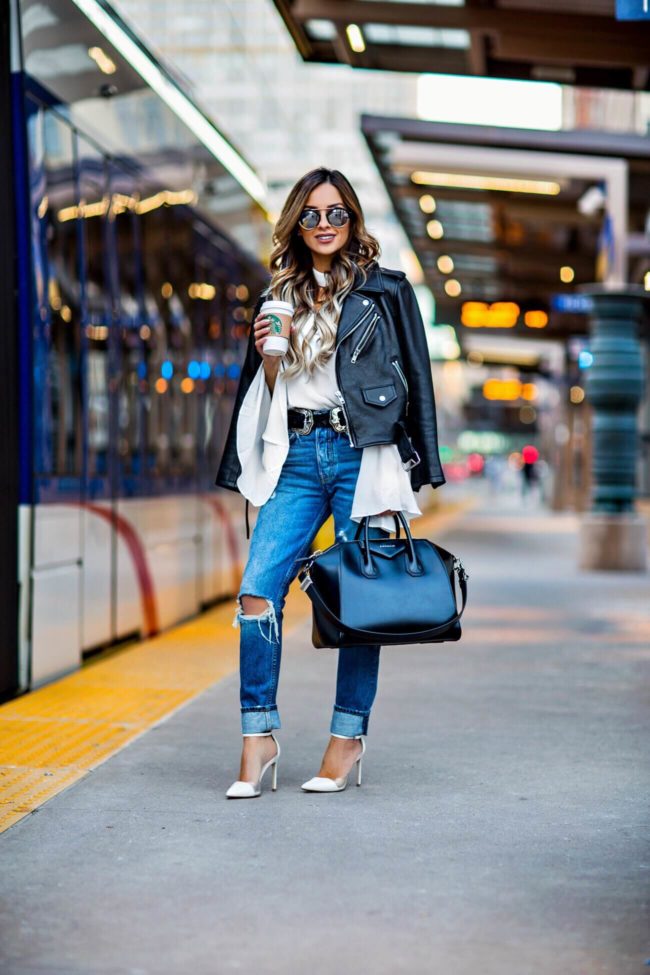 fashion blogger mia mia mine wearing a white endless rose top and grlfrnd jeans from revolve