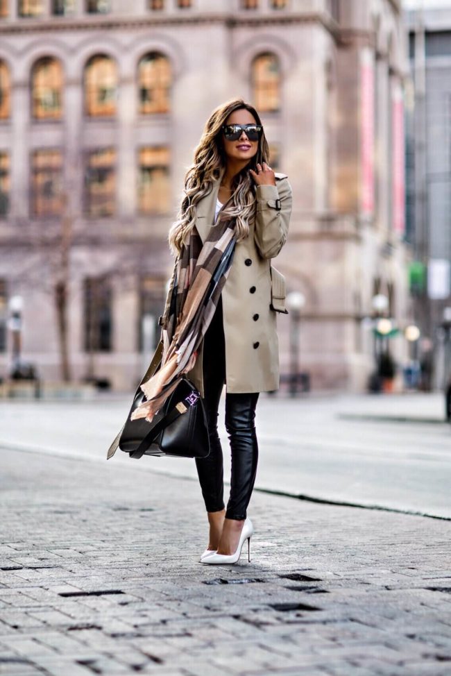 fashion blogger mia mia mine wearing a burberry trench coat and christian louboutin so kate heels