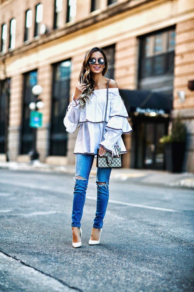 fashion blogger mia mia mine wearing white christian louboutin heels and a few moda top