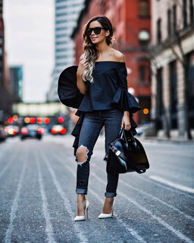 fashion blogger mia mia mine wearing a bell sleeve top from few moda, gray levi's jeans and a christian louboutin white heels