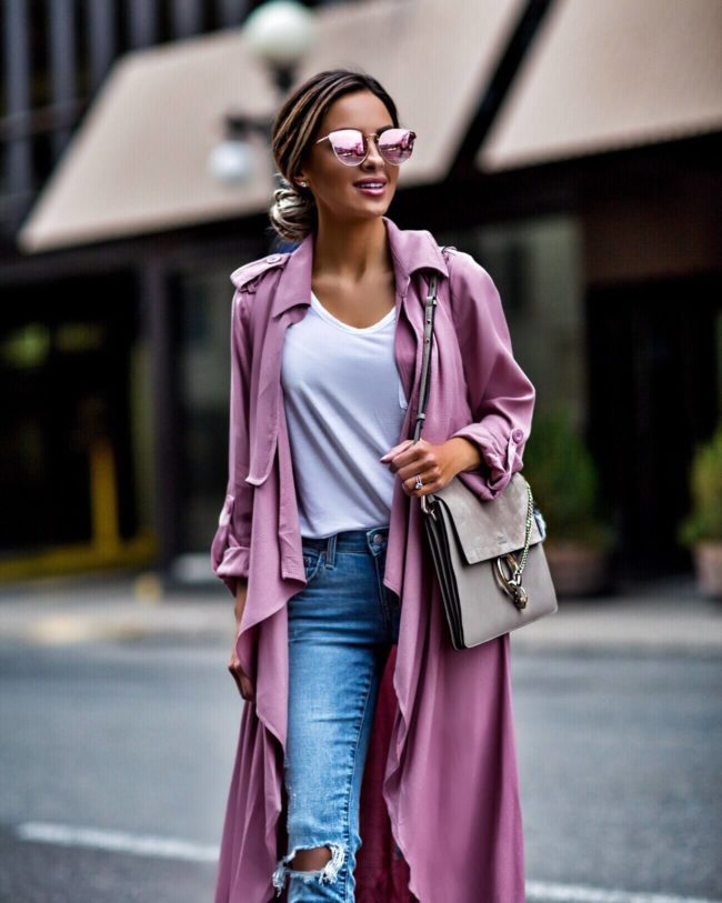 fashion blogger mia mia mine wearing a pink trench coat for spring