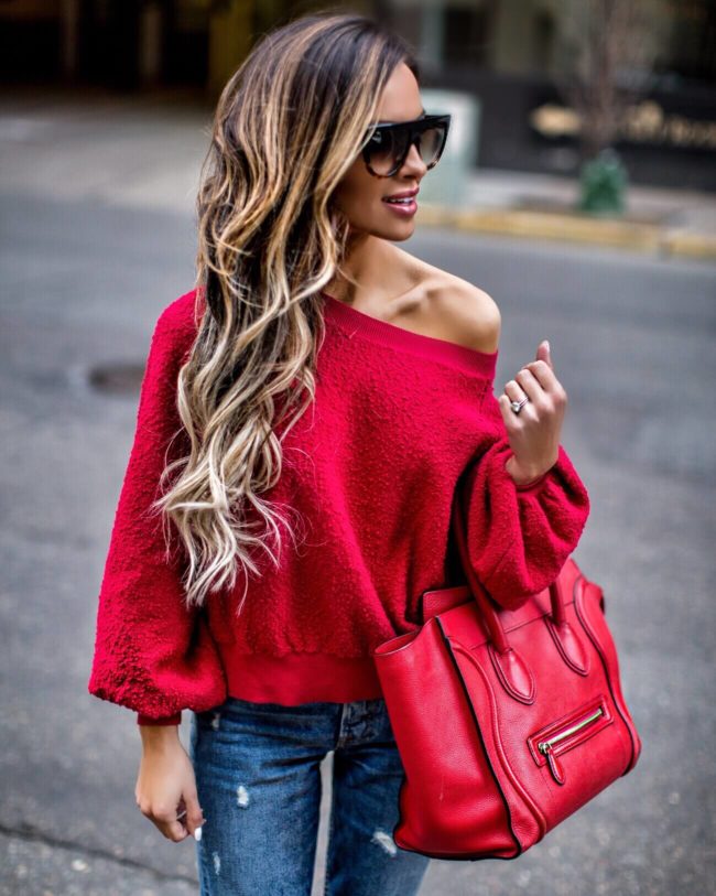 fashion blogger mia mia mine wearing a red sweatshirt from nordstrom