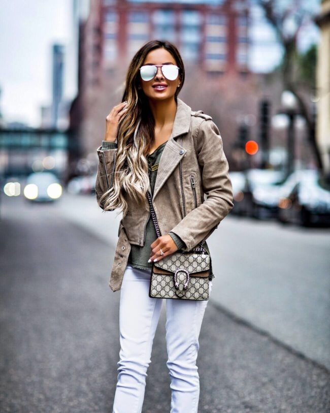 fashion blogger mia mia mine wearing a suede jacket and gucci dionysus bag