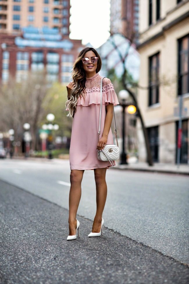 mn fashion blogger mia mia mine wearing a pink dress for spring from express