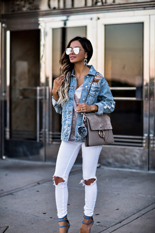 fashion blogger mia mia mine wearing a topshop denim studded jacket and le specs aviator sunglasses