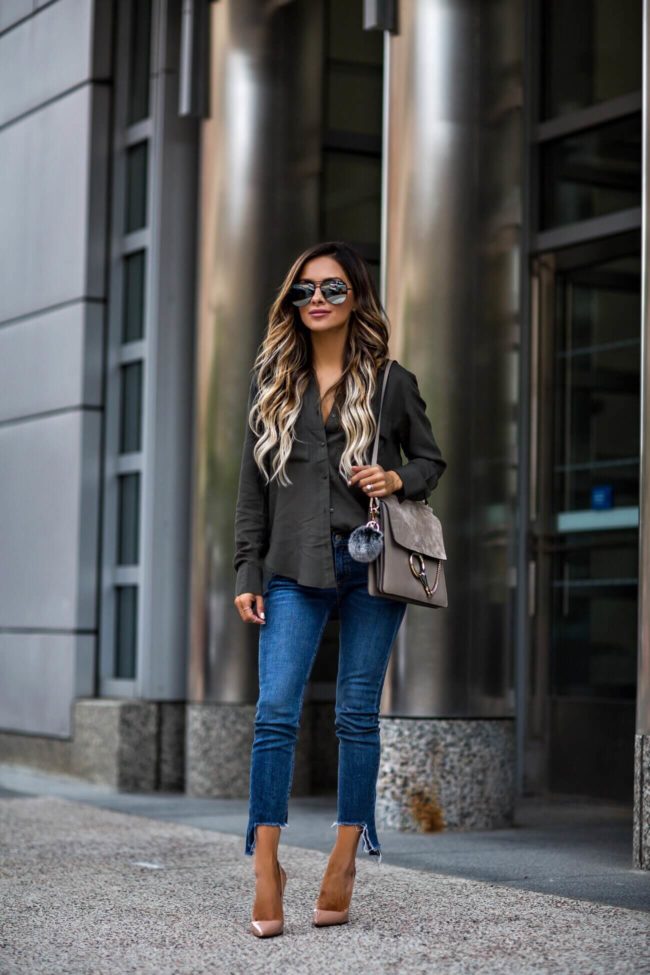 fashion blogger mia mia mine wearing an olive button-down and a chloe faye medium bag