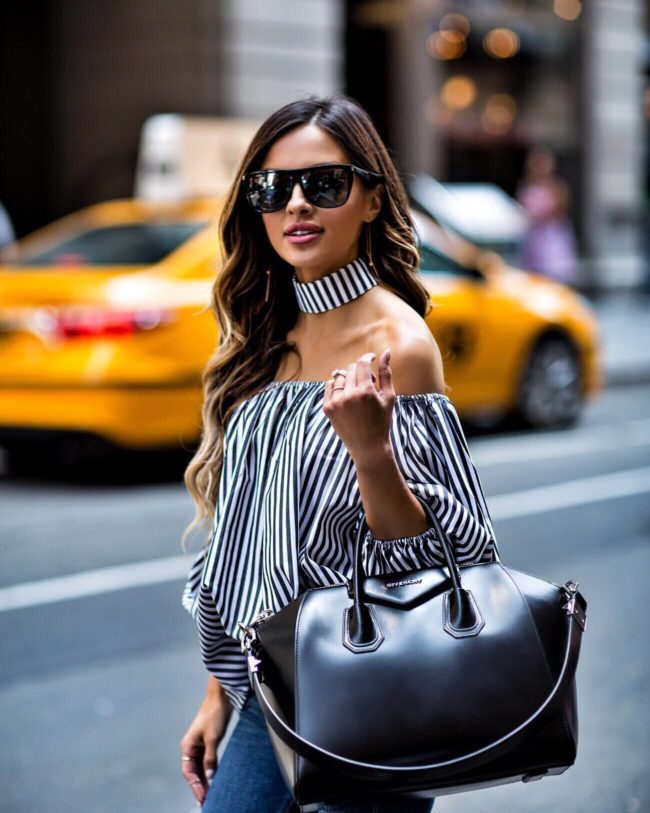 fashion blogger mia mia mine wearing a striped top from forever 21