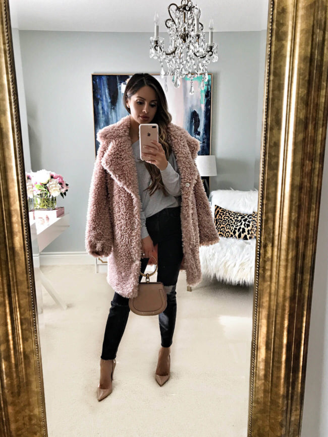 fashion blogger mia mia mine wearing a pink faux fur coat from the nordstrom anniversary sale 2017