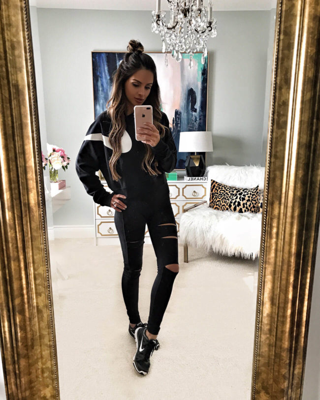 fashion blogger mia mia mine wearing a nike sweatshirt from the nordstrom anniversary 2017