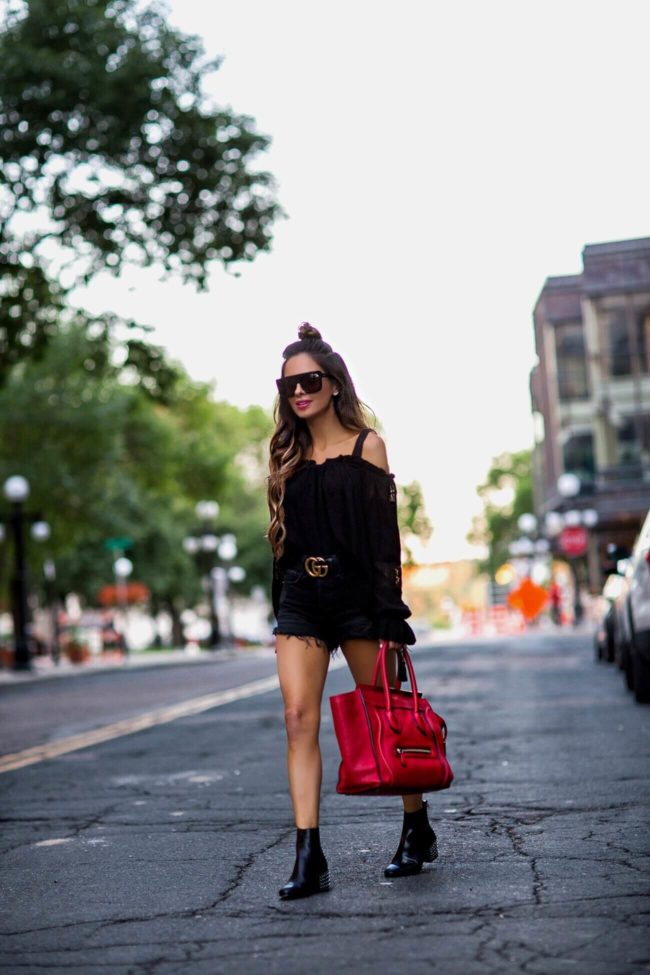 fashion blogger mia mia mine wear black sunglasses by quay and a gucci belt