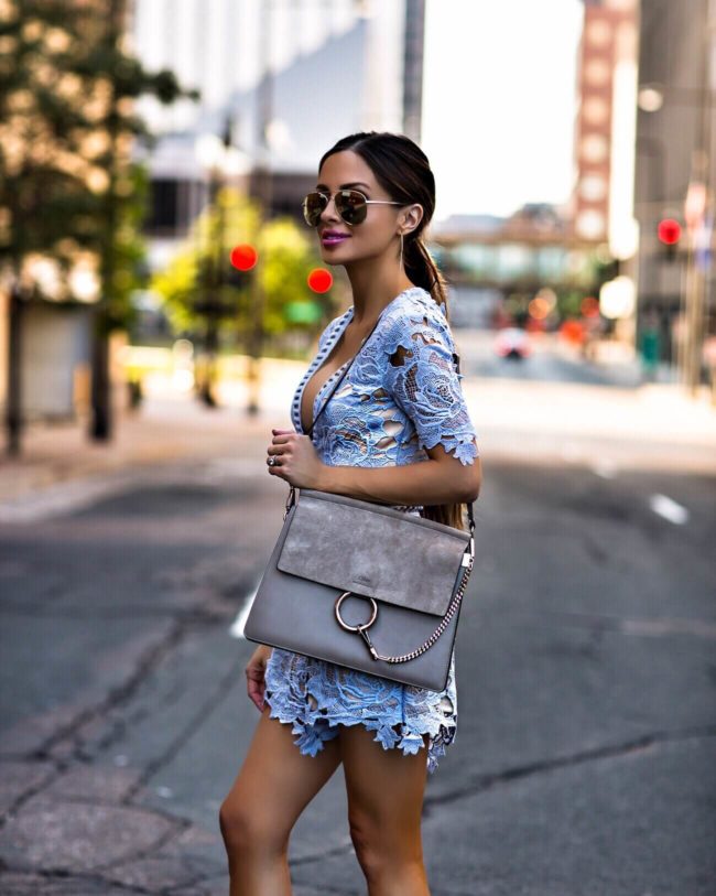 fashion blogger mia mia mine wearing a blue lace romper from nordstrom