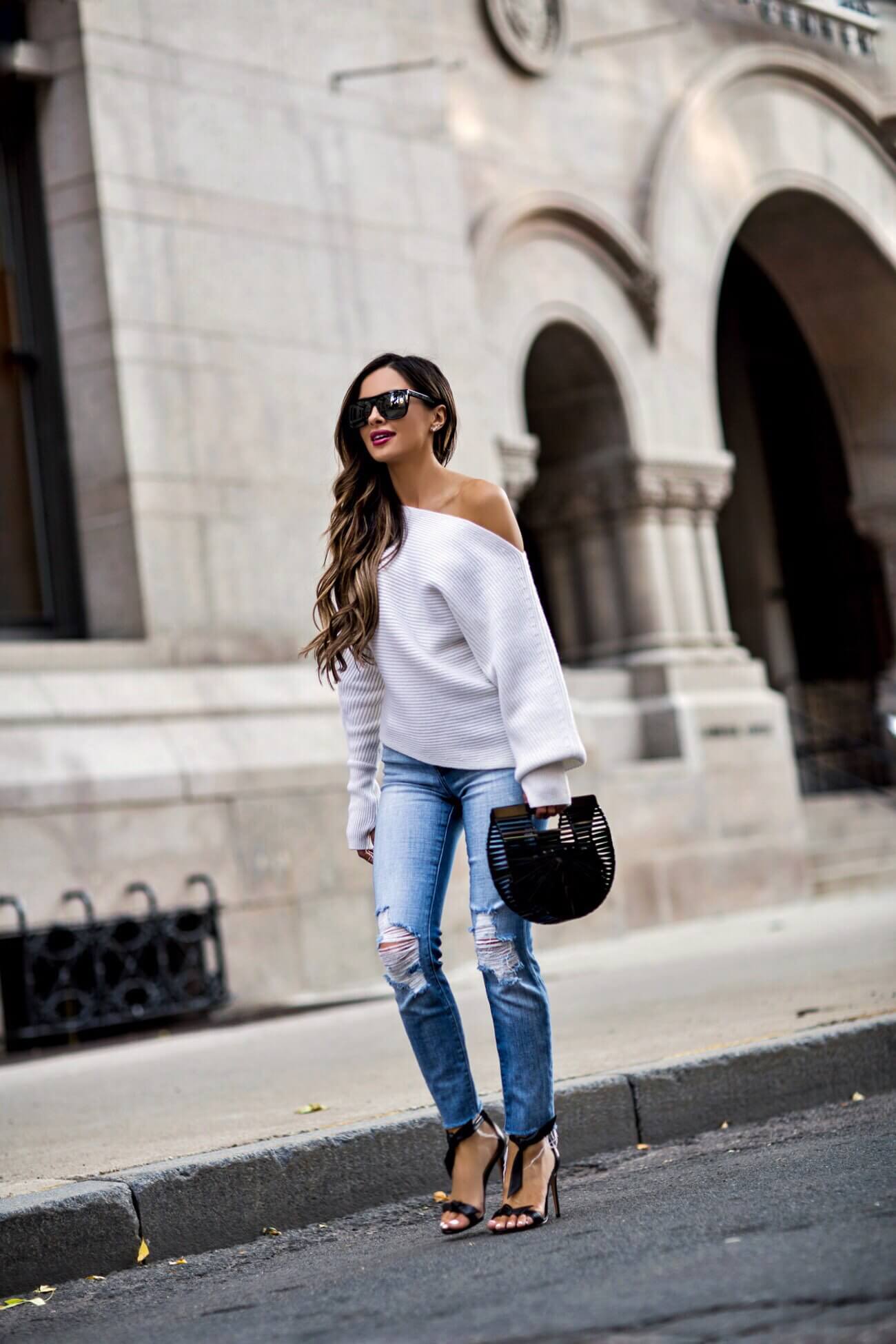 fashion blogger mia mia mine wearing a fall outfit from intermix