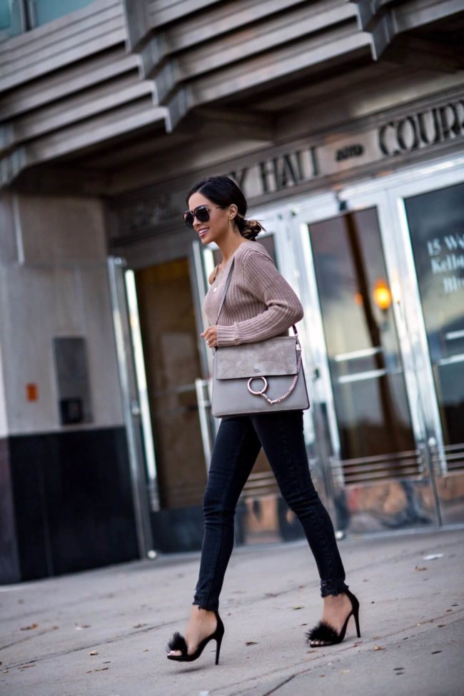 fashion blogger mia mia mine wearing a chloe bag and na-kd sweater