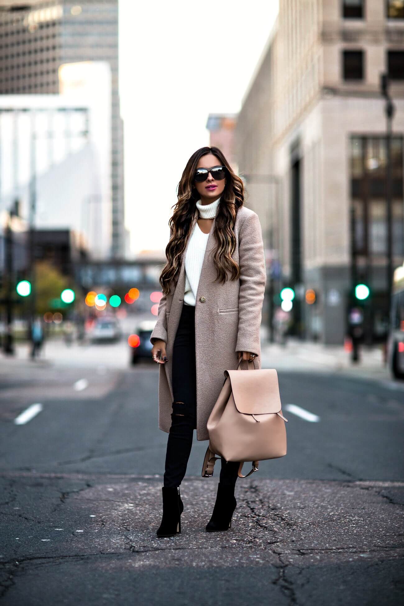 fashion blogger mia mia mine wearing a camel coat from bloomingdales
