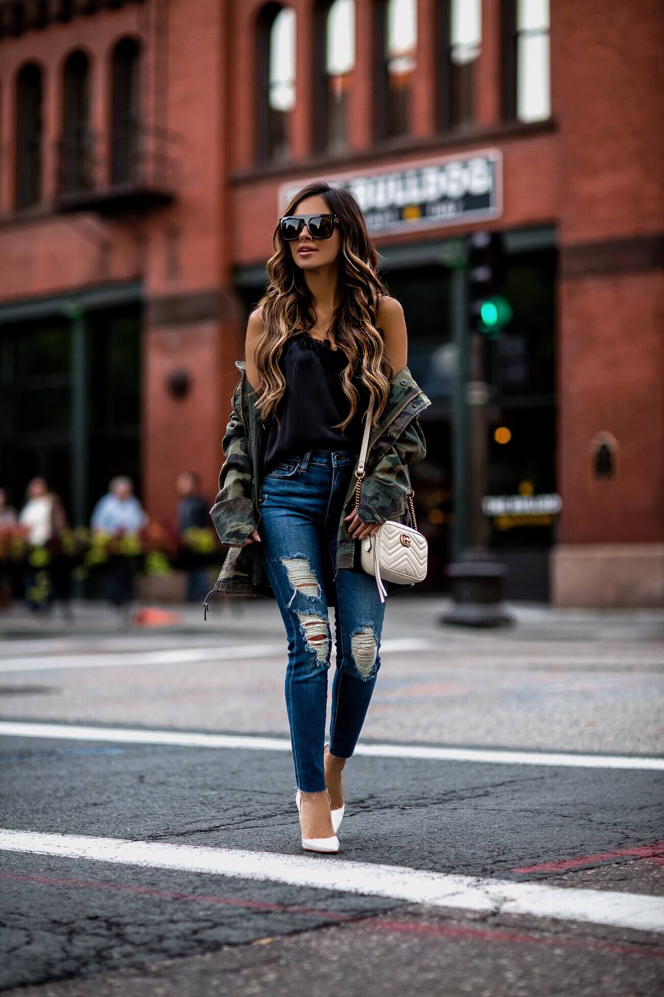 fashion blogger mia mia mine wearing a camo jacket from shopbop and a gucci marmont white mini bag