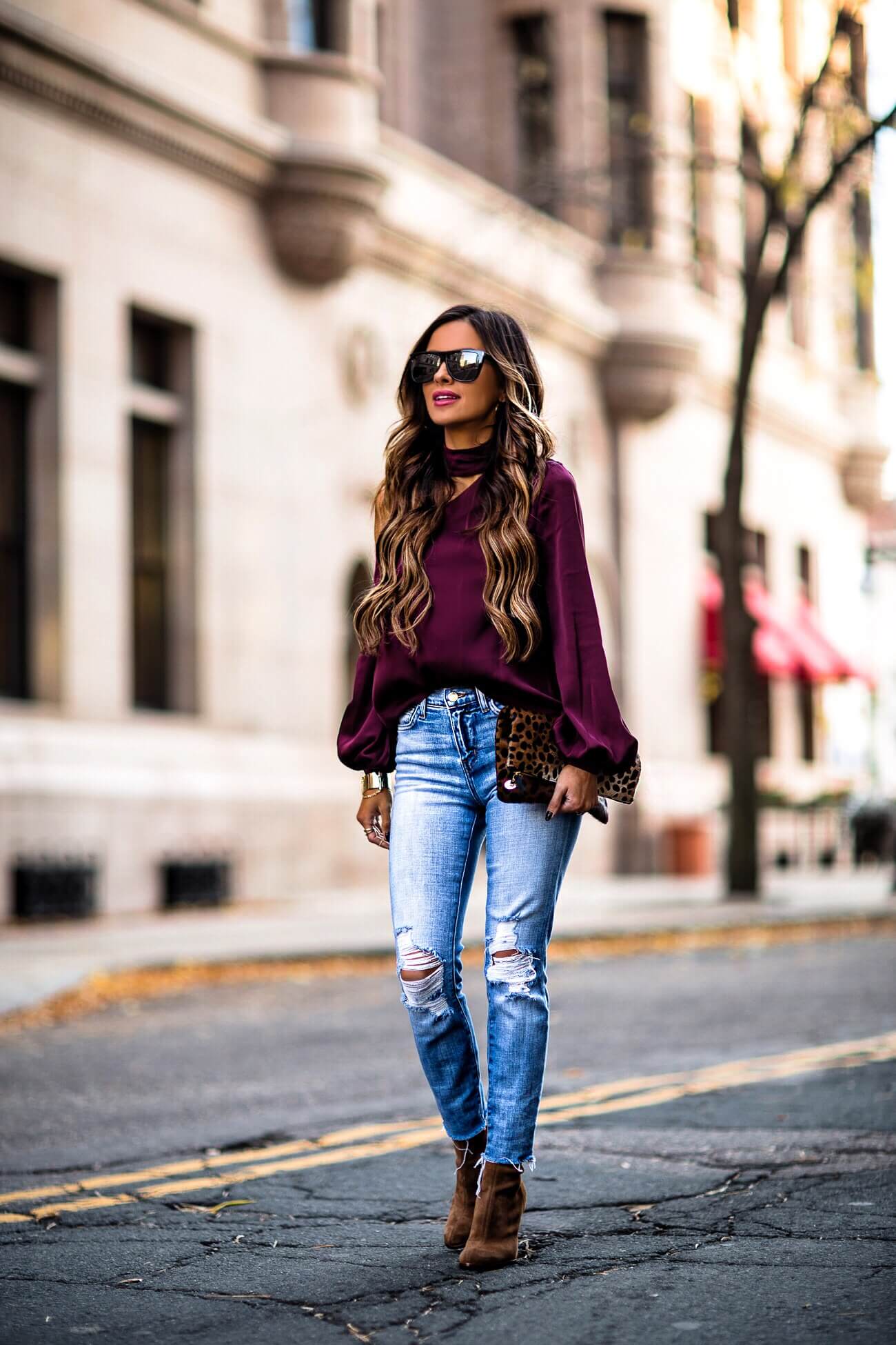 fashion blogger mia mia mine wearing a purple top and l'agence denim from intermix