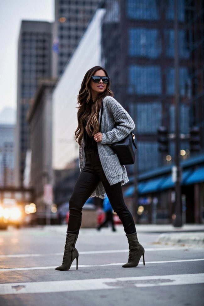 fashion blogger mia mia mine wearing a gray free people cardigan and tommy hilfiger backpack