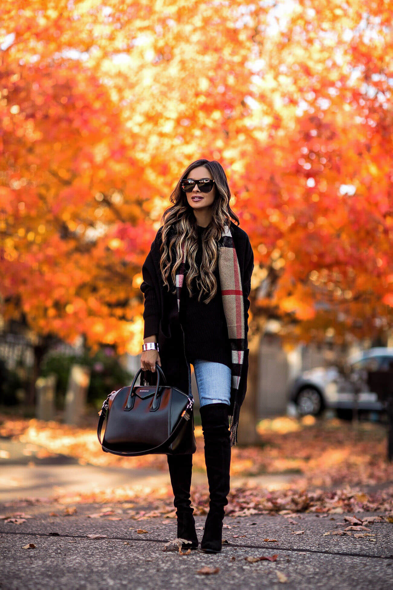 fashion blogger mia mia mine wearing a burberry scarf and stuart weitzman OTK boots