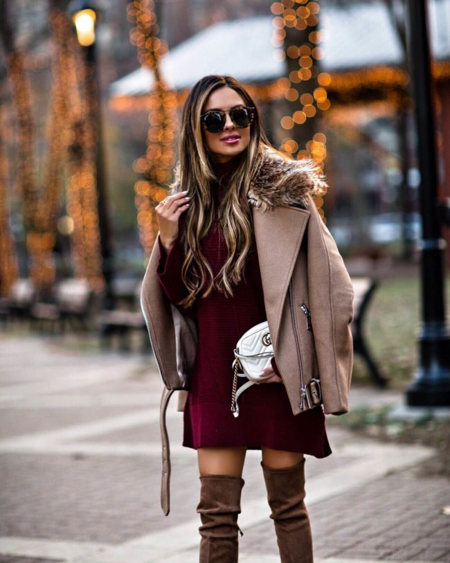 mia mia mine wearing a camel coat from H&M