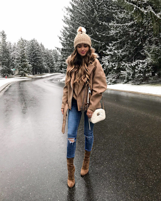 fashion blogger mia mia mine wearing a camel coat and a beanie hat from nordstrom