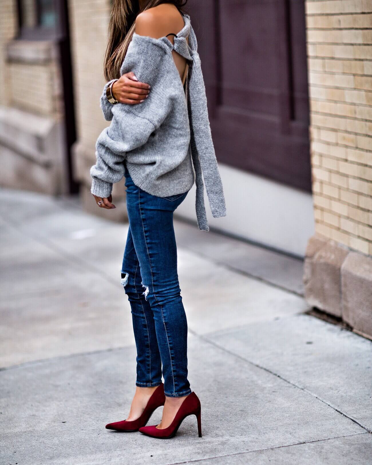 fashion blogger mia mia mine wearing red heels and an open back sweater from elevtd