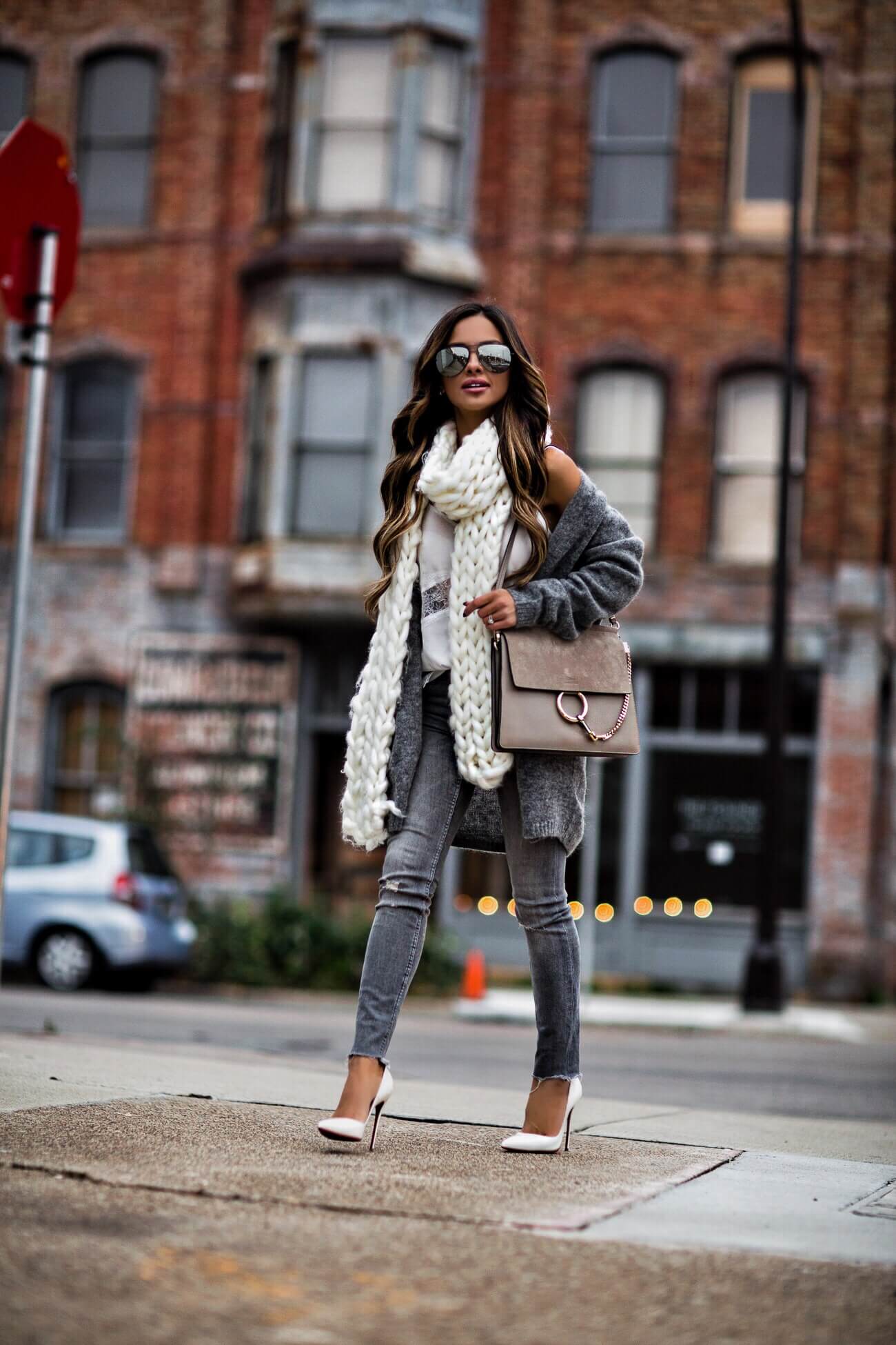fashion blogger mia mia mine wearing a gray cardigan sweater from H&M and a chloe faye medium bag