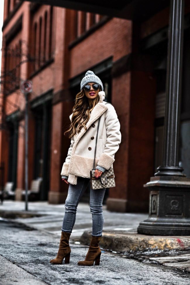 fashion blogger mia mia mine wearing a mother sherpa jacker from shopbop