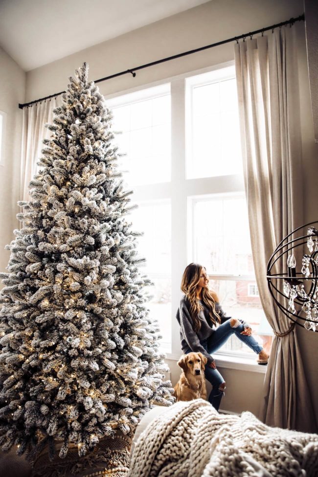 fashion blogger mia mia mine in her living room at home for christmas