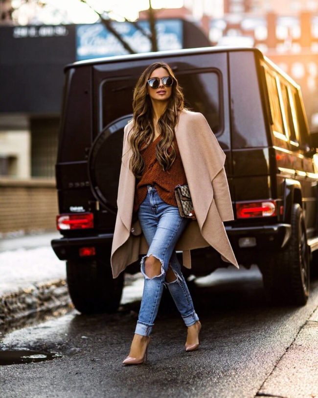 fashion blogger mia mia mine wearing a camel coat
