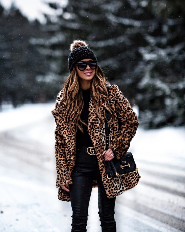 mia mia mine wearing a leopard coat and gucci belt