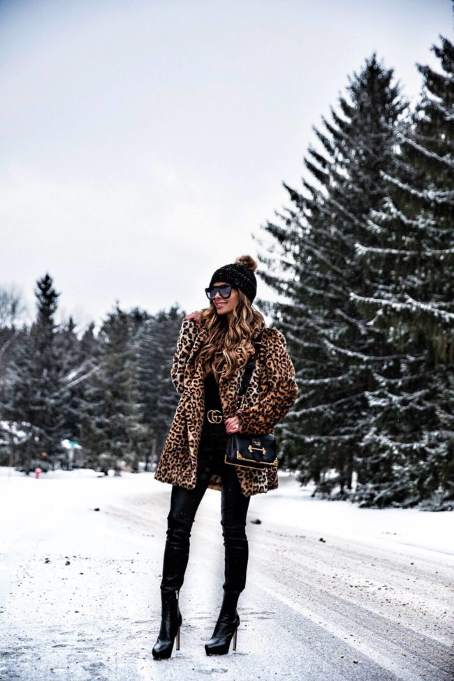 fashion blogger mia mia mine wearing a leopard coat by joa and a prada cahier bag