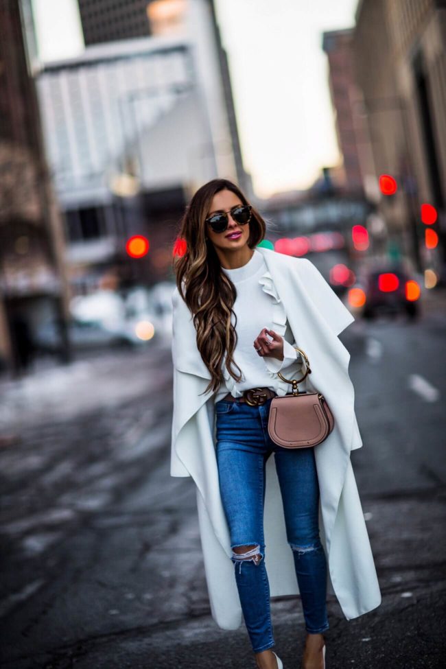 fashion blogger mia mia mine wearing a white missguided coat and chloe nile nag