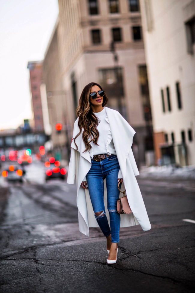fashion blogger mia mia mine wearing a white missguided coat and gucci double g belt