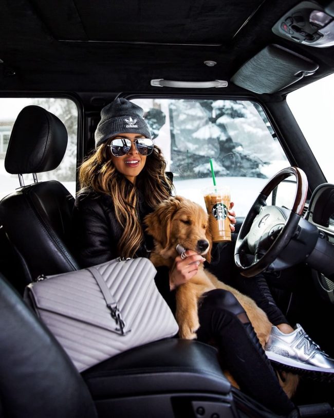 mia mia mine wearing an adidas beanie and new balance silver sneakers