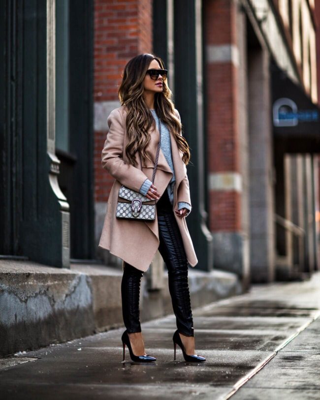 fashion blogger mia mia mine wearing a gucci dionysus bag and a camel coat