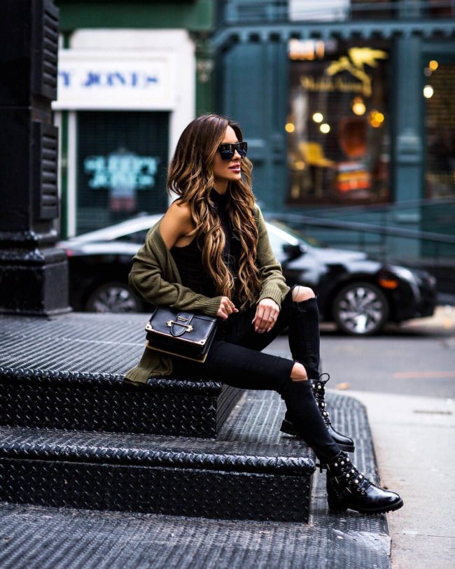 fashion blogger mia mia mine wearing a green sweater from H&M and zara boots