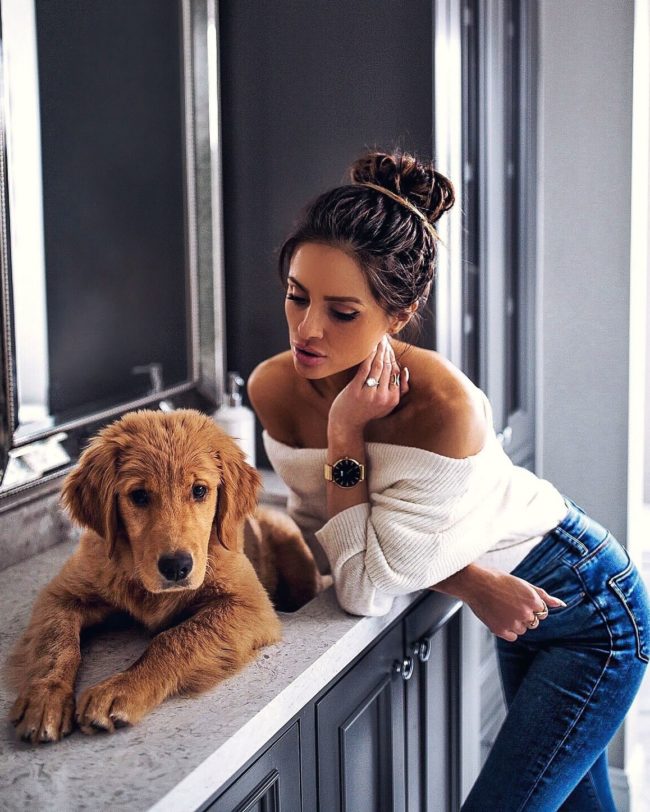 mia mia mine wearing a white off-the-shoulder sweater