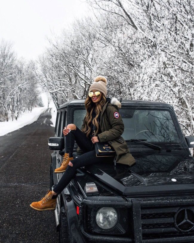 mia mia mine wearing a canada goose jacket and timberland boots