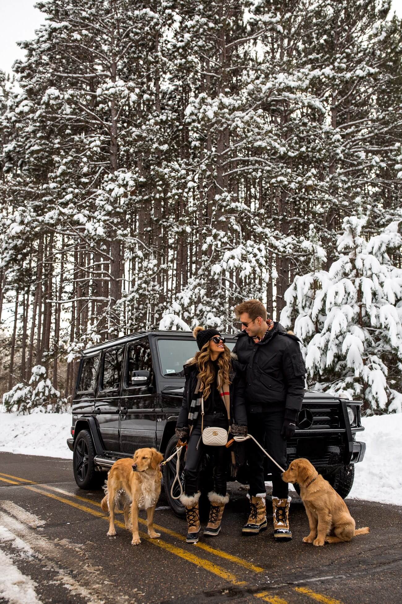 fashion blogger mia mia mine with husband and golden retrievers