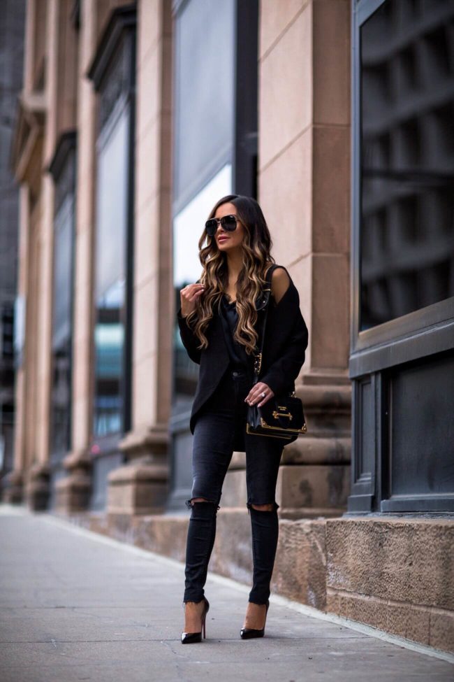 fashion blogger mia mia mine wearing a prada cahier bag and a black lovers + friends blazer from revolve
