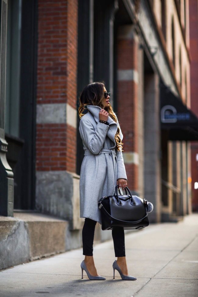 fashion blogger mia mia mine wearing a gray winter coat and gray gianvito rossi heels