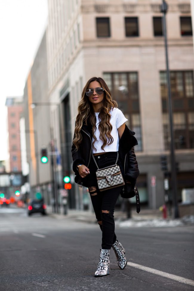 fashion blogger mia mia mine wearing a karla x hanes crop top and a gucci dionysus bag