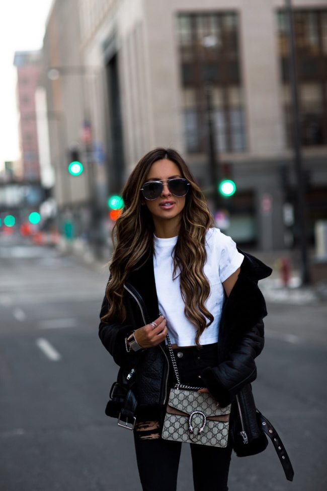 fashion blogger mia mia mine wearing a karla x hanes crop top and an H&M biker jacket