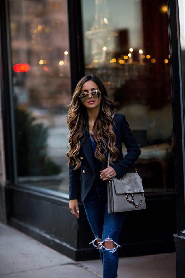 fashion blogger mia mia mine wearing a chloe faye medium bag and a navy blazer from shopbop