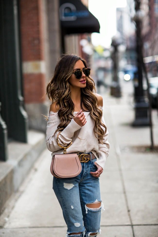 fashion blogger mia mia mine wearing an H&M sweater and a chloe nile bag