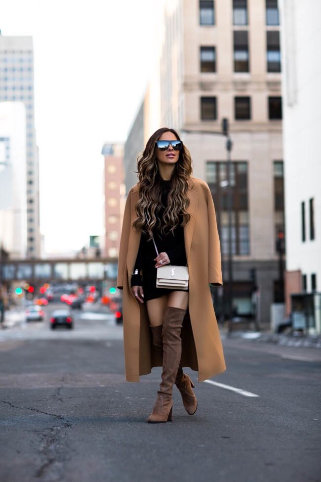 fashion blogger mia mia mine wearing a camel coat and stuart weitzman hiline over the knee brown boots