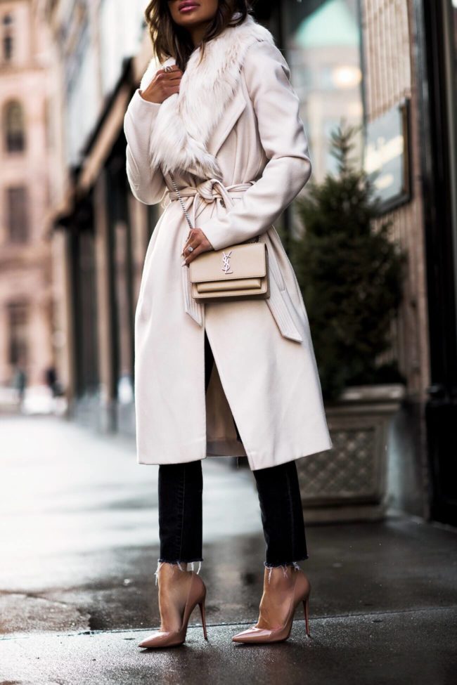 fashion blogger mia mia mine wearing a saint laurent crossbody bag and louboutin heels